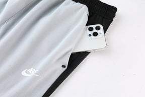 CONJUNTO NIKE TECH FLEECE PRETO E CINZA